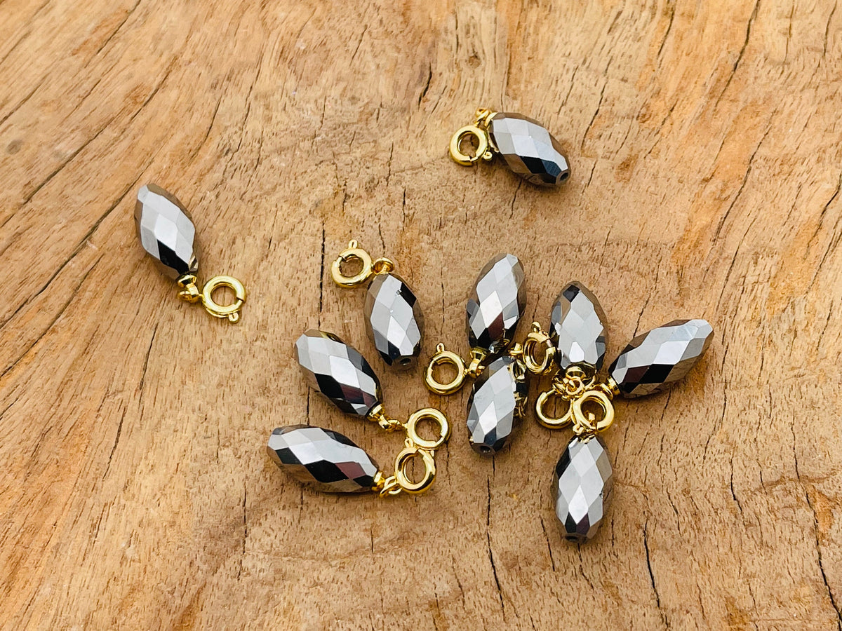 Terahertz crystal pendant for jewelry making by GemstoneGO, featuring a polished, rectangular gemstone with a silver bail.