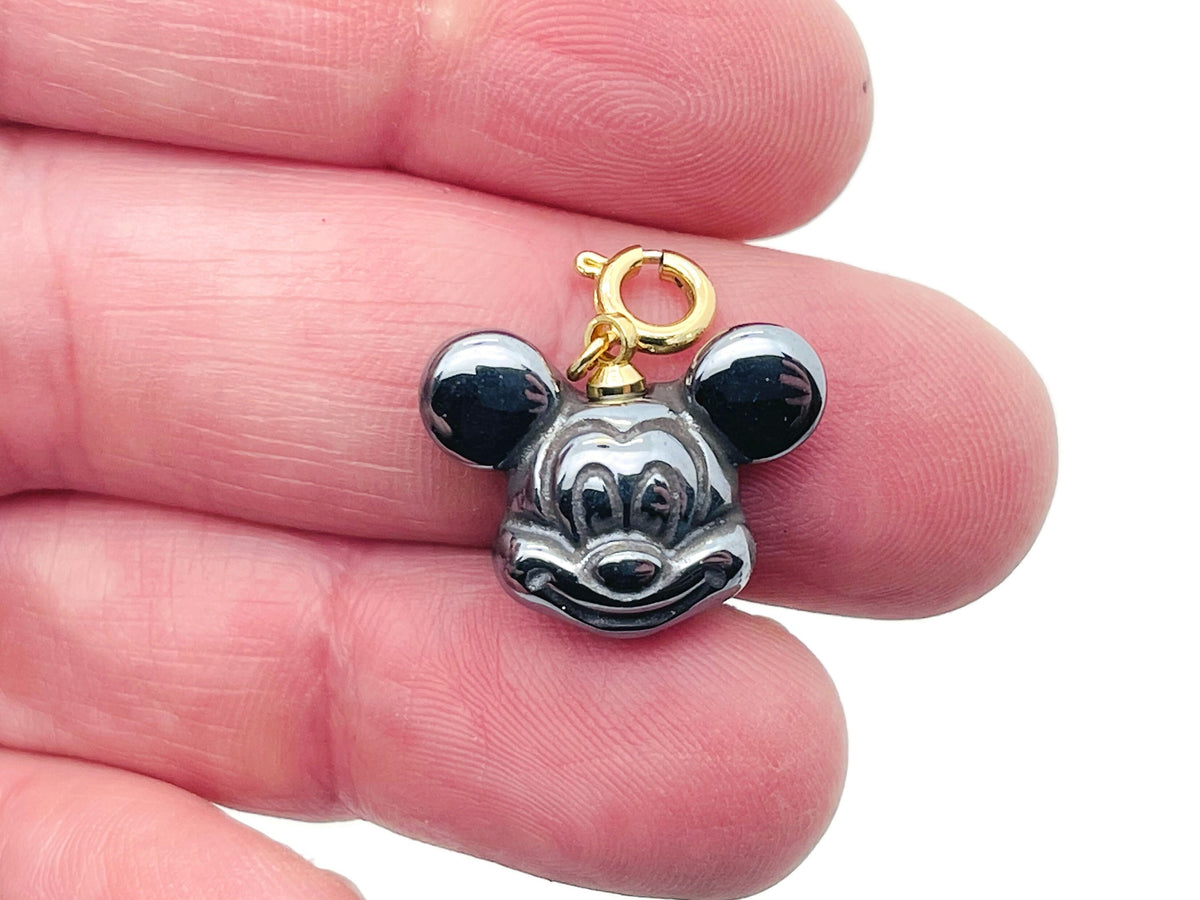 Terahertz Mouse Crystal Pendant by GemstoneGO featuring a detailed mouse-shaped design with a shiny, polished crystal surface.