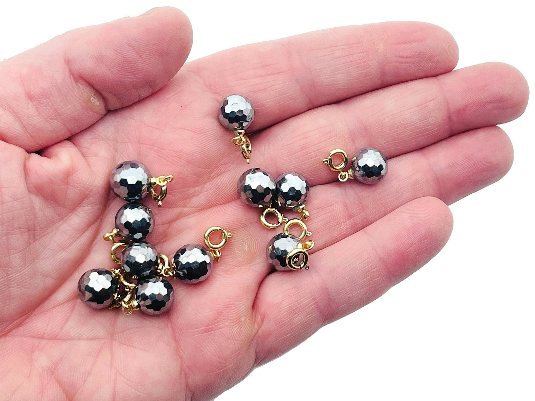 Terahertz gemstone pendant from GemstoneGO, showcasing a polished gemstone for jewelry making on a neutral background.