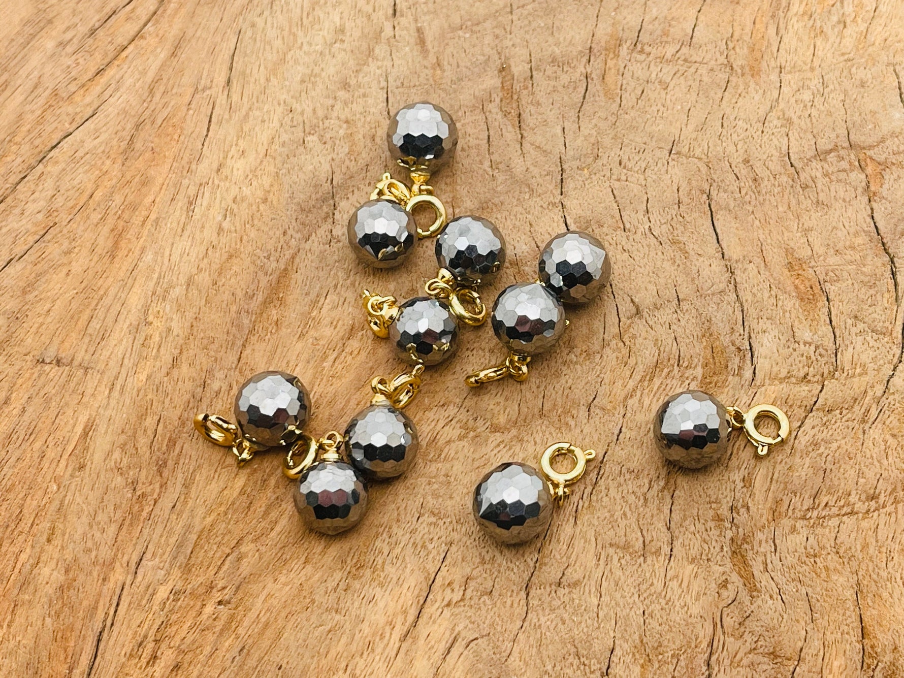 Terahertz gemstone pendant from GemstoneGO featuring a polished, vibrant gemstone set in a delicate jewelry making design.
