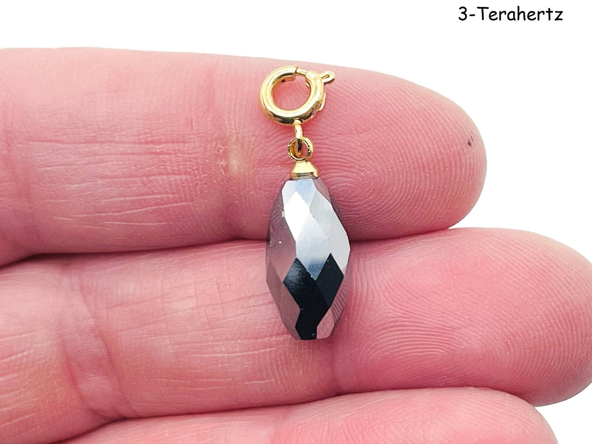 Terahertz gemstone pendant from GemstoneGO, featuring a polished, vibrant gemstone for jewelry making on a plain background.