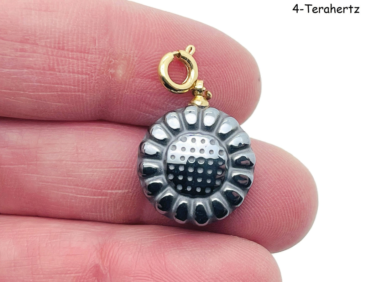 GemstoneGO terahertz gemstone pendant for jewelry making, showcasing a colorful, polished gemstone on a silver chain.