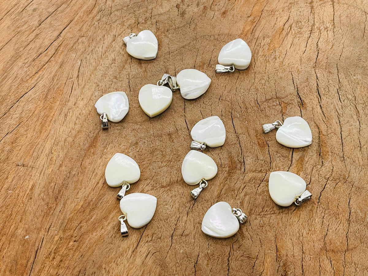 Natural pearl heart pendant with mini crystal accent, showcasing elegant design and gemstone details from GemstoneGO.