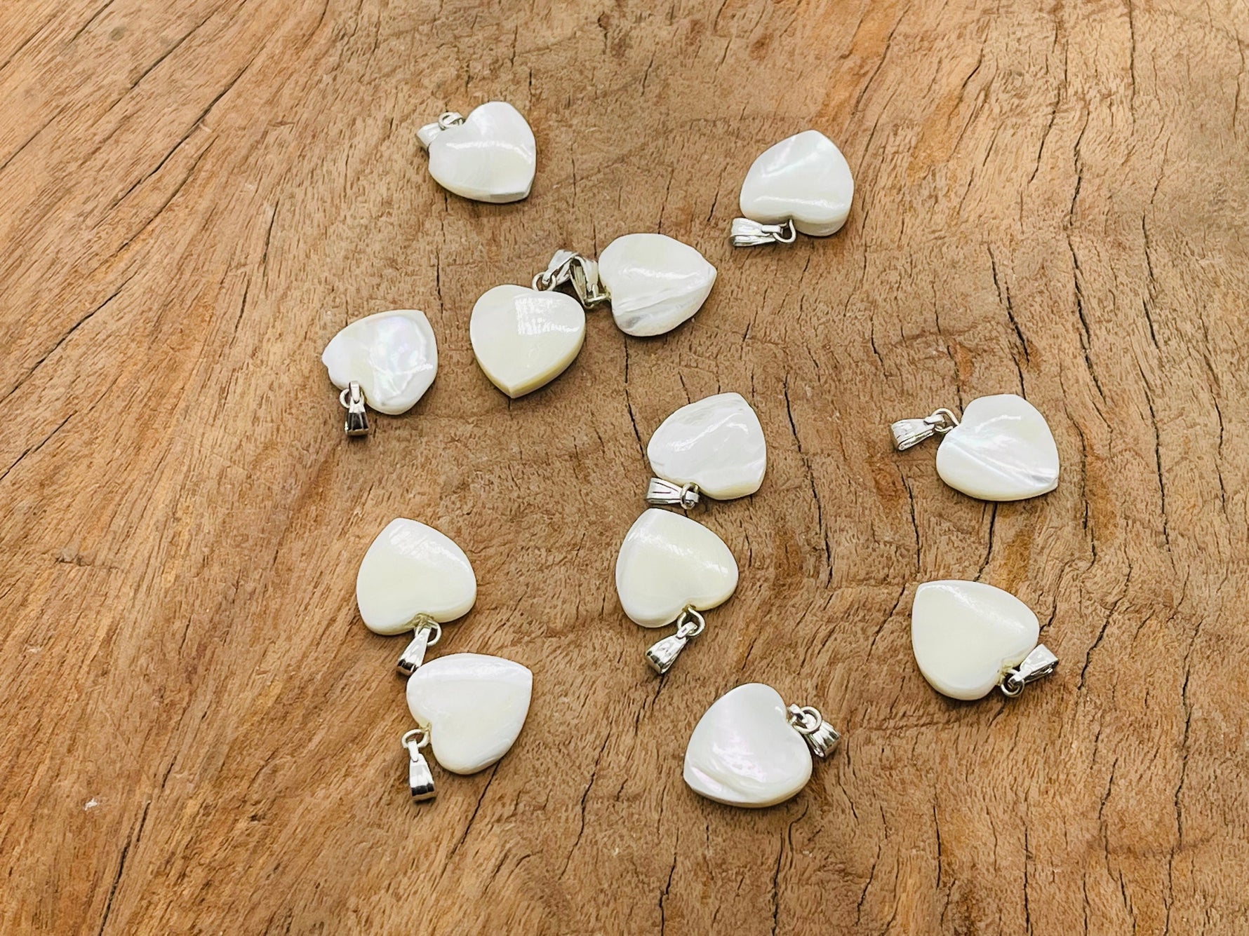 Natural pearl heart pendant with mini crystal accent, showcasing elegant design and gemstone details from GemstoneGO.