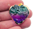 Green and purple rainbow aura heart crystal pendant from GemstoneGO, showcasing vibrant loose crystal with iridescent finish.