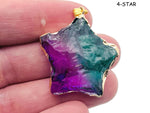 Rainbow Aura Heart Crystal Pendant by GemstoneGO featuring a moon-star-heart design and a loose, shimmering rainbow-colored crystal.