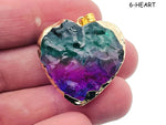 Rainbow Aura Heart Crystal Pendant featuring moon, star, and heart shapes from GemstoneGO, showcasing vibrant, shimmering loose crystal.
