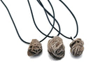 Desert Rose Selenite gemstone necklace featuring a crystal pendant on a corn-colored cord, from GemstoneGO.