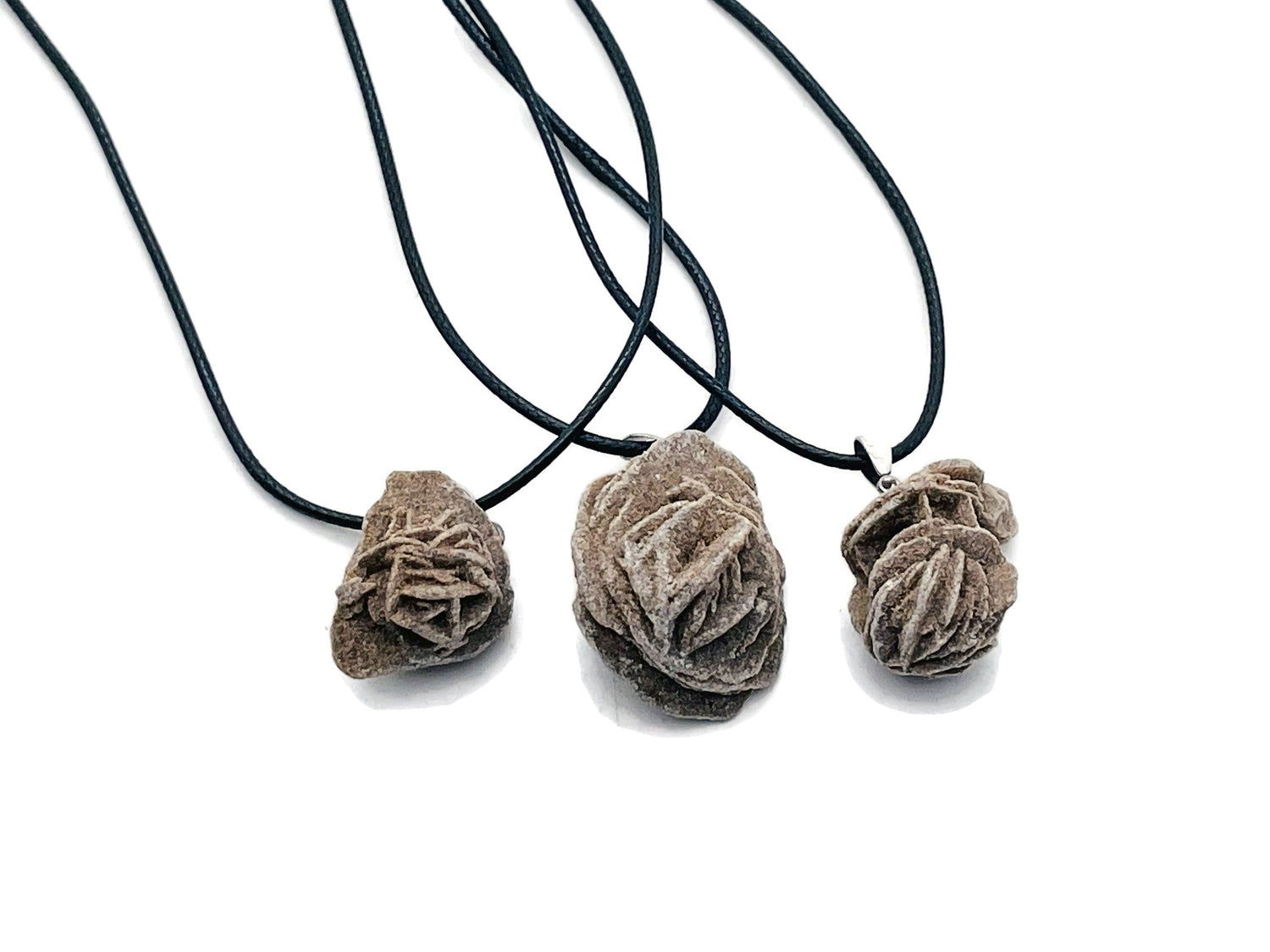 Desert Rose Selenite gemstone necklace featuring a crystal pendant on a corn-colored cord, from GemstoneGO.