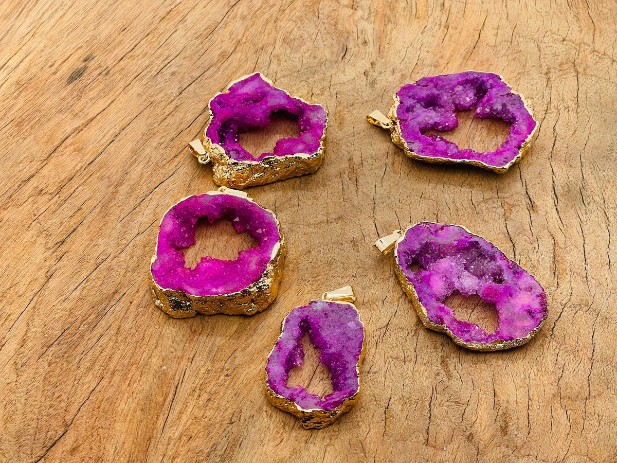 Pink agate geode druzy slice pendant with natural crystal sparkle, crafted by GemstoneGO, showcasing vibrant pink and textured geode details.