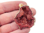 Red Agate geode druzy slice crystal pendant with natural textured surface, featuring vibrant red tones and gemstone details.