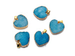 Blue agate heart geode druzy slice pendant from GemstoneGO featuring a polished blue agate crystal with sparkling druzy details.