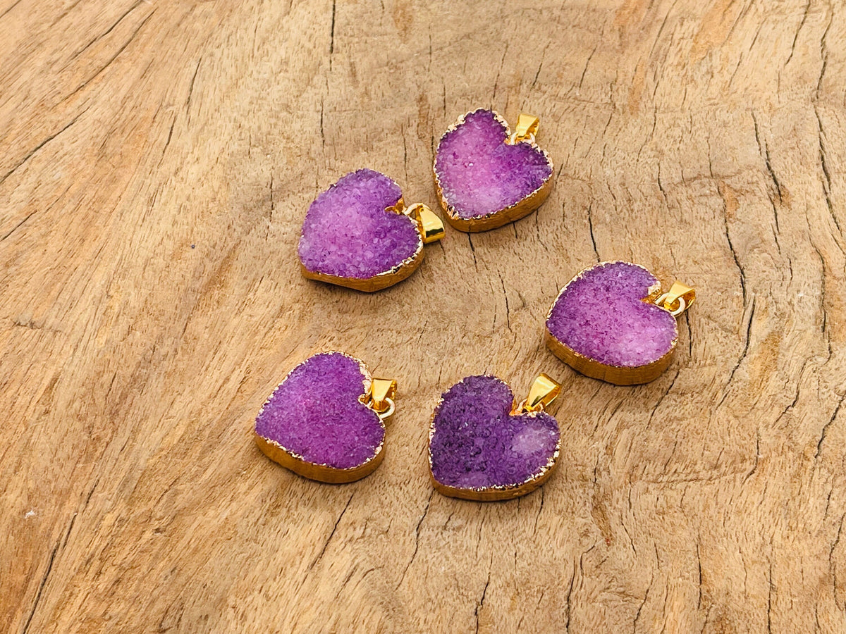 Purple agate heart geode pendant with druzy crystal details, featuring a natural gemstone design from GemstoneGO.