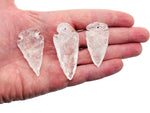 Clear quartz arrow point pendant from GemstoneGO, drilled crystal jewelry with a polished, pointed crystal design.
