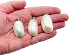White natural pearl pendant from GemstoneGO with a silver setting, perfect for jewelry making or adding elegance to designs.