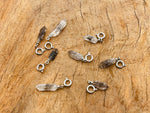 Herkimer Diamond crystal pendant featuring a sparkling gemstone setting, ideal for making jewelry or as a birthstone pendant.