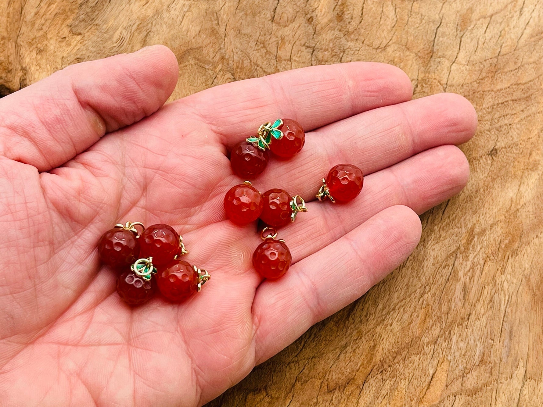 Carnelian crystal pendant from GemstoneGO, showcasing a vibrant orange gemstone with a silver bail for jewelry making.