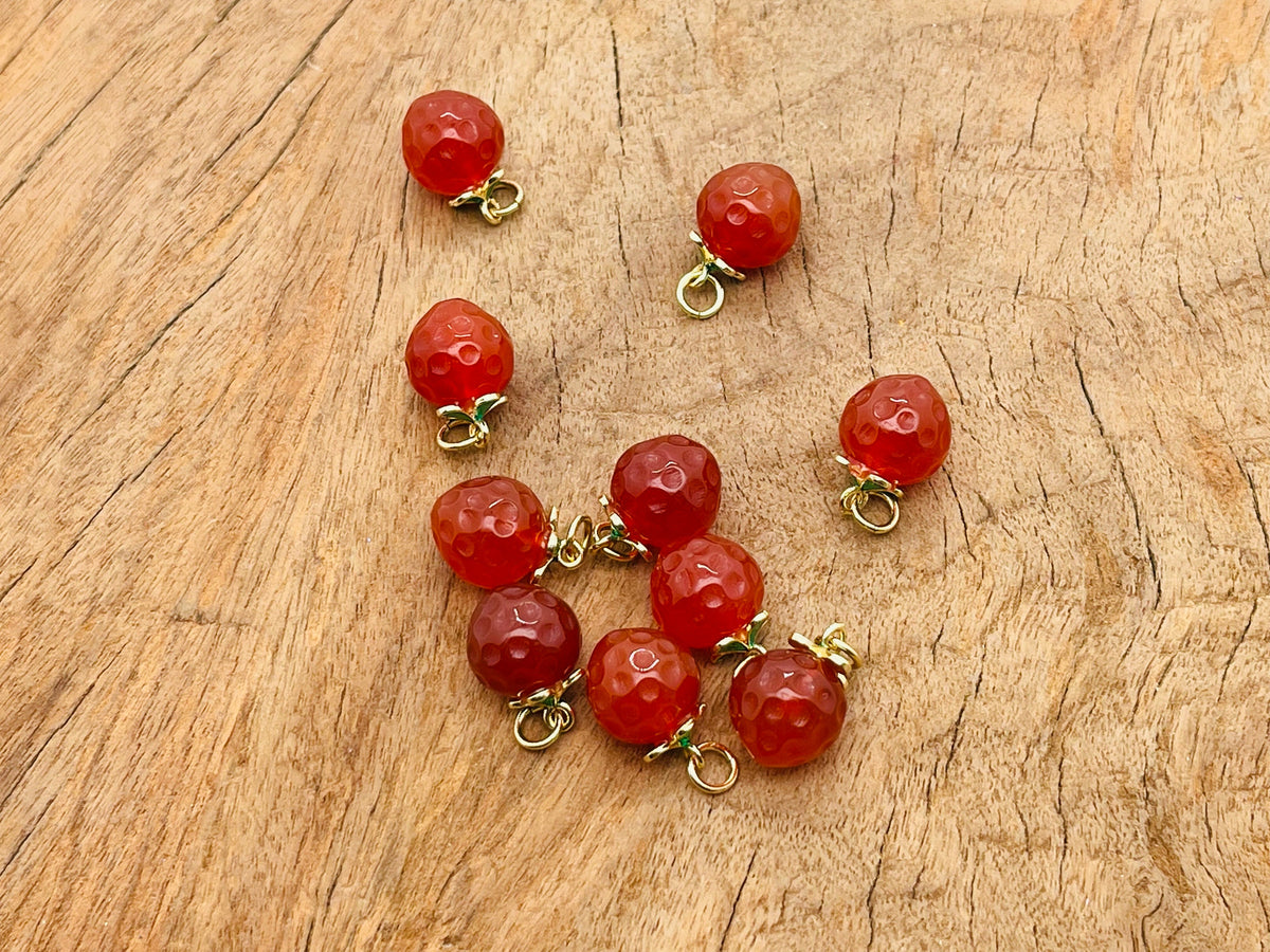 Carnelian crystal pendant from GemstoneGO, showcasing a vibrant orange gemstone with silver setting, ideal for jewelry making.