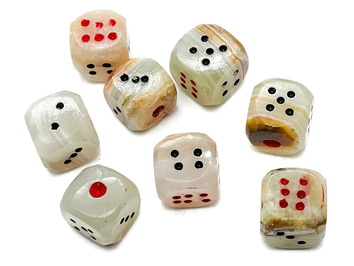 Carved Afghanistan Jade crystal dice from GemstoneGO, featuring a polished gemstone with intricate carvings for gaming or display.