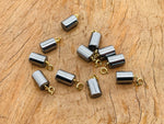 Terahertz crystal pendant from GemstoneGO, showcasing a polished gemstone for jewelry making on a neutral background.