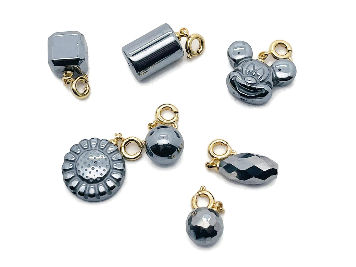 GemstoneGO terahertz gemstone pendant for jewelry making, showcasing a polished, colorful gemstone on a silver bail.