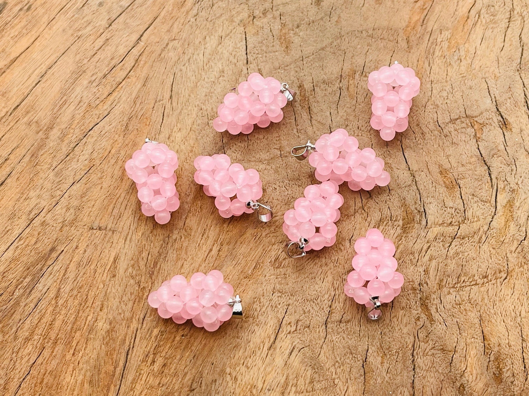 Rose Quartz Grape Crystal Pendant by GemstoneGO, featuring a detailed grape-shaped crystal pendant on a delicate chain.