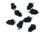 Obsidian Grape Crystal Pendant by GemstoneGO featuring a detailed crystal grape design on a silver chain.