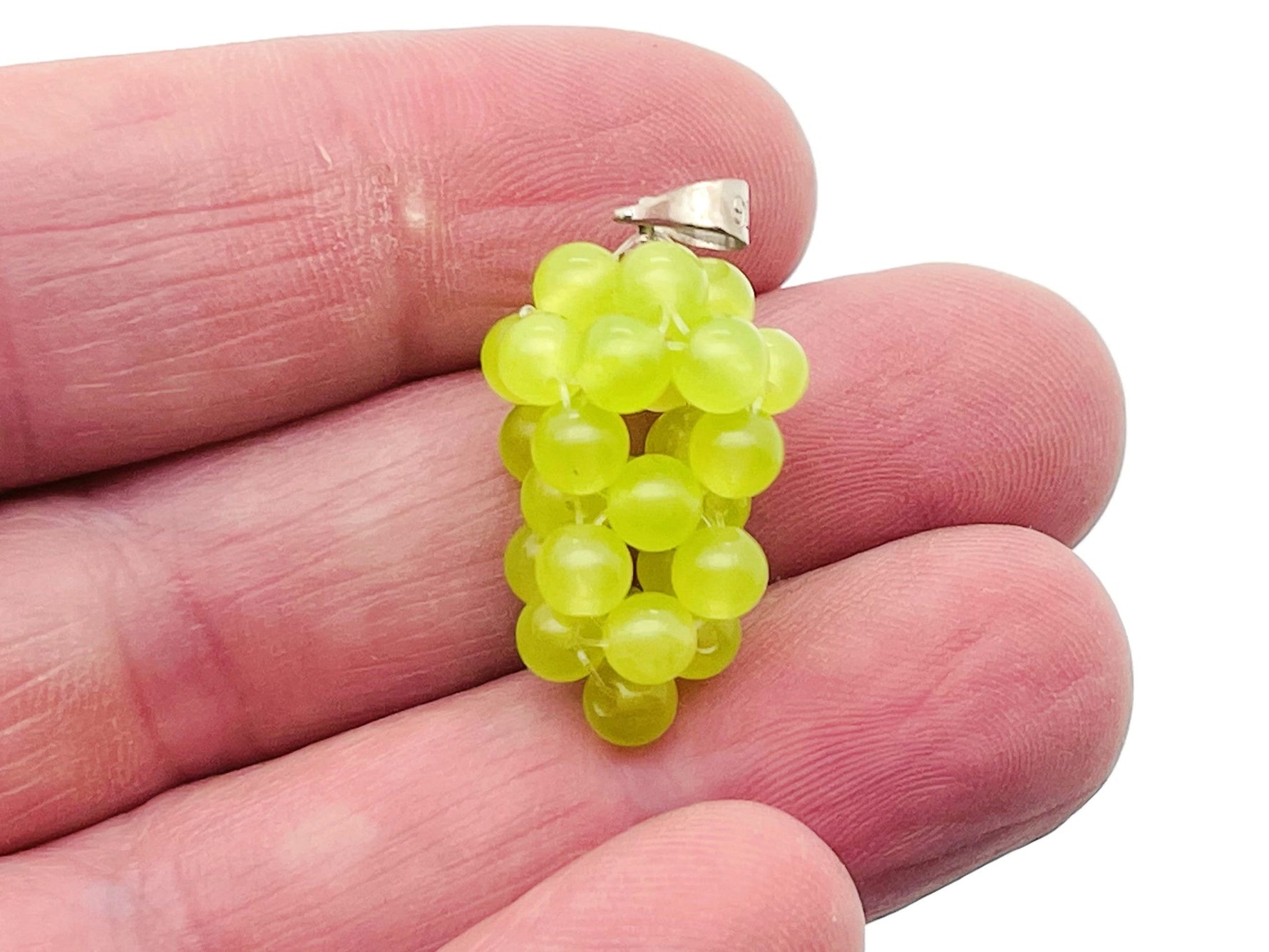 Green Agate Grape Crystal Pendant by GemstoneGO, featuring a detailed crystal grape design with vibrant green agate accents.