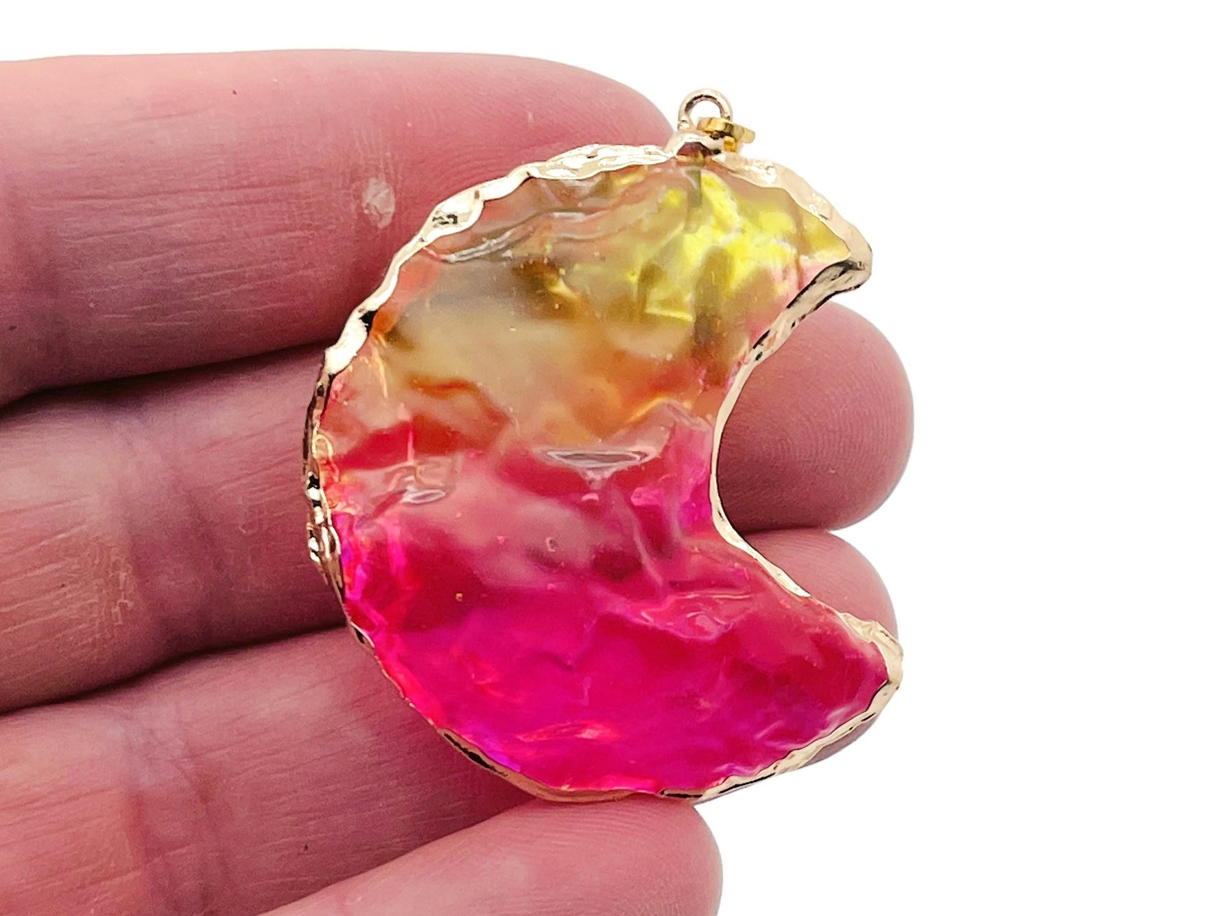 Rainbow Aura Moon Crystal Pendant featuring yellow-pink quartz, showcasing a vibrant love stone gemstone from GemstoneGO.