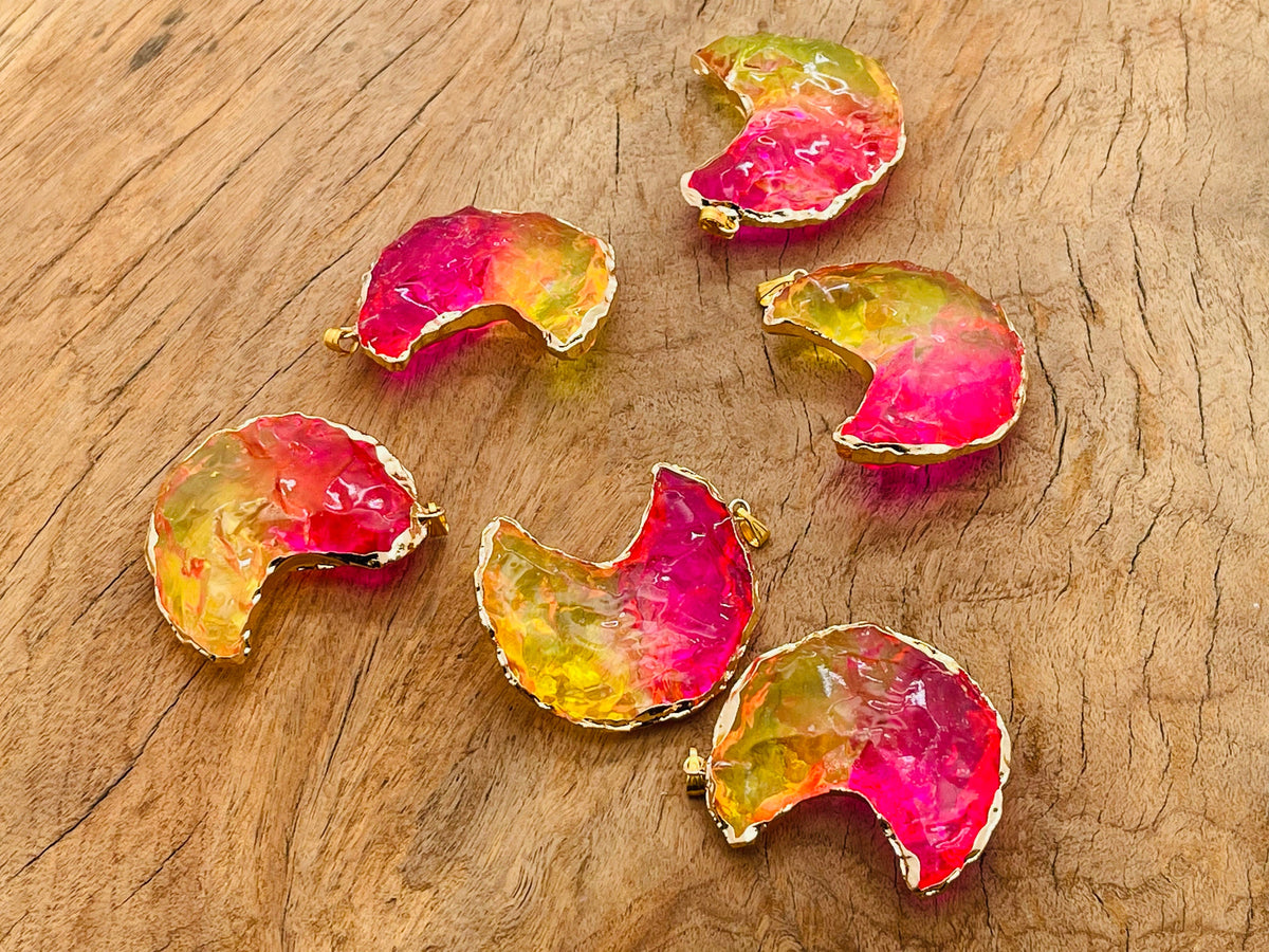 Yellow-pink quartz rainbow aura moon crystal pendant with love stone setting, from GemstoneGO, showcasing vibrant colors and detailed design.