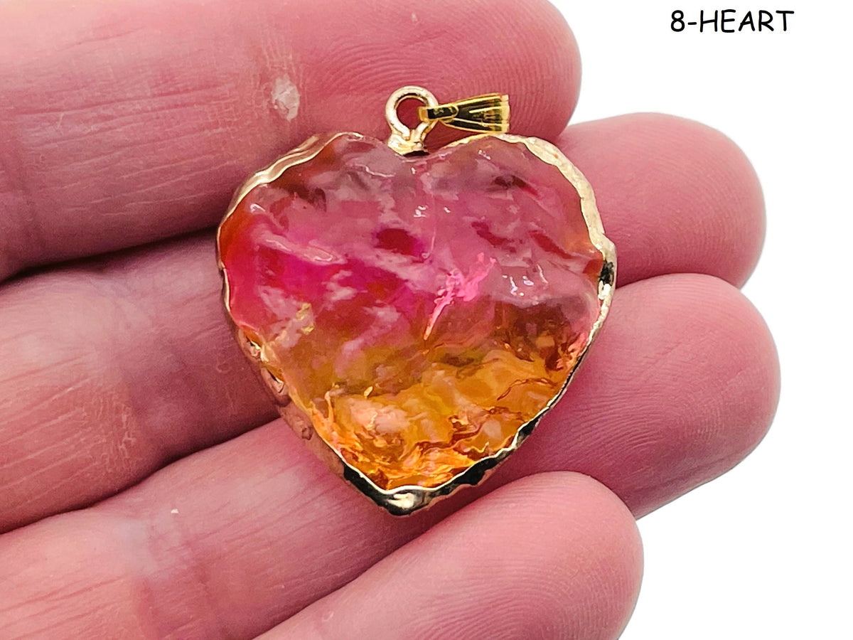 Rainbow Aura Heart Crystal Pendant from GemstoneGO, featuring a moon-star-heart design with a vibrant, colorful aura finish.