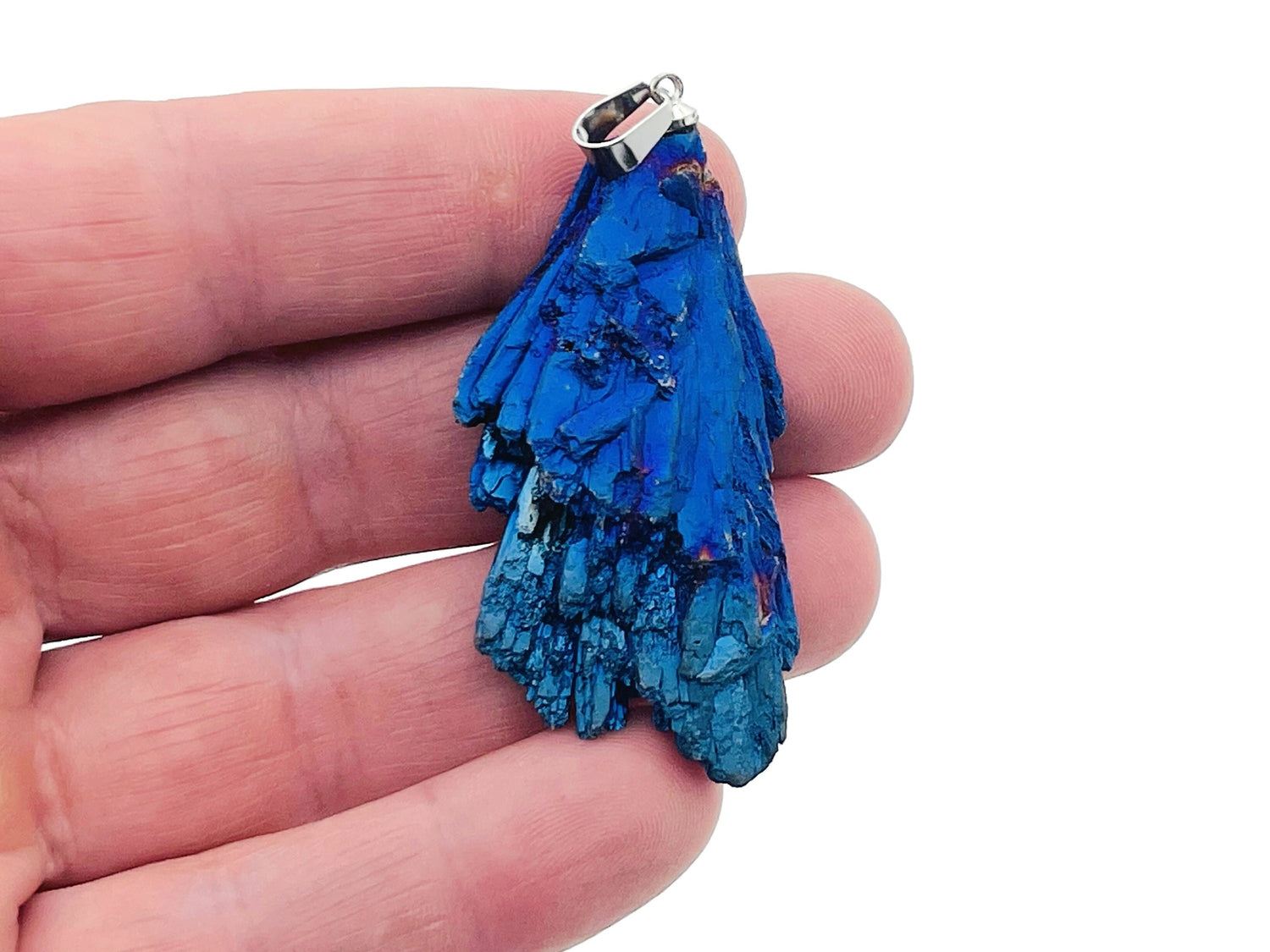 Blue Kyanite fan crystal pendant from GemstoneGO featuring a vibrant blue stone with fan-shaped crystal design.