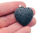 Lava heart pendant with a gemstone, showcasing a spiritual stone design from GemstoneGO on a chain.