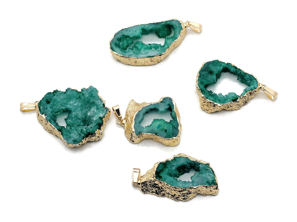 Green agate geode druzy slice pendant with gold-tone bail, showcasing vibrant green crystal and natural textured geode surface.