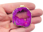 Pink agate geode druzy slice pendant with crystal detail, handcrafted gemstone jewelry by GemstoneGO featuring a unique geode design.
