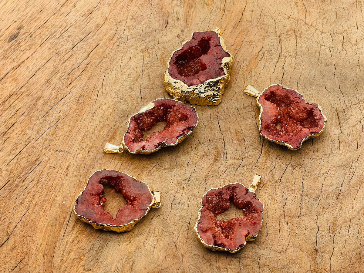 Red agate geode druzy slice crystal pendant from GemstoneGO, showcasing a vibrant red agate geode with sparkling druzy interior.