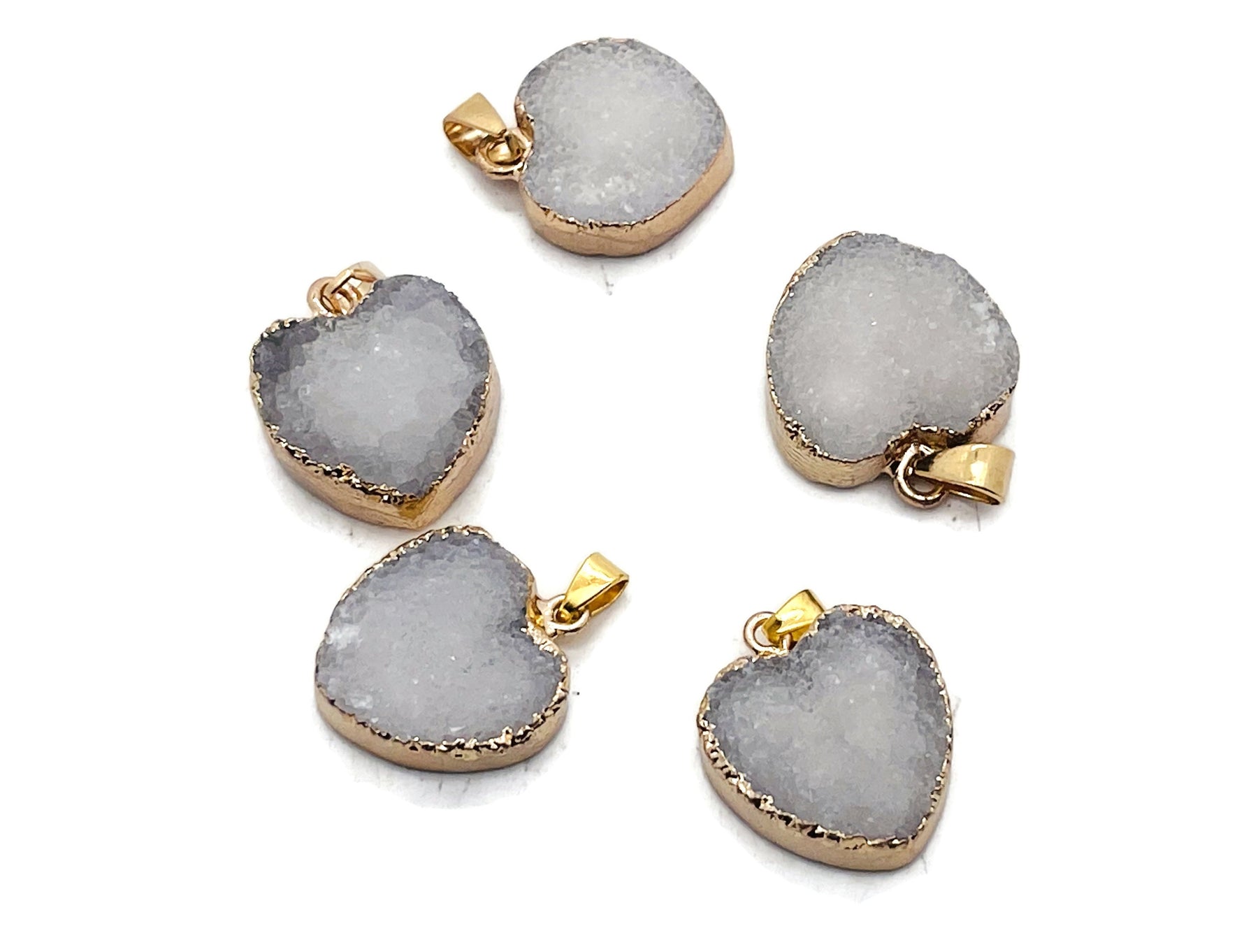 White agate heart geode druzy pendant with crystal interior, featuring a natural gemstone pendant from GemstoneGO.
