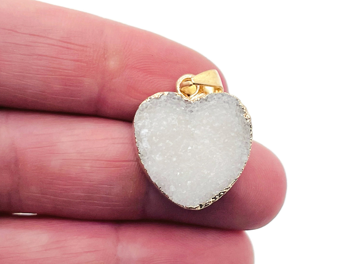 White agate heart geode druzy crystal pendant with natural gemstone texture, featuring a polished agate slice and sparkling druzy details.
