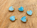 Blue agate heart geode pendant with druzy crystal slice, crafted by GemstoneGO, showcasing vibrant blue and glittering crystal details.