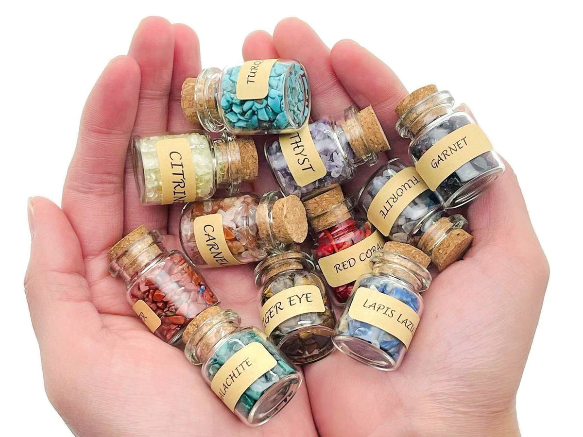 Assorted gemstone chips in a small bottle, featuring mini crystal semi-tumbled stones for energy and decorative use.