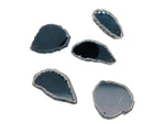 Black Agate slice with drilled hole, geode crystal pendant showcasing polished edges and natural banding patterns.