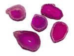 Pink agate slice drilled pendant with natural gemstone texture and hole, showcasing a vibrant pink geode crystal from GemstoneGO.