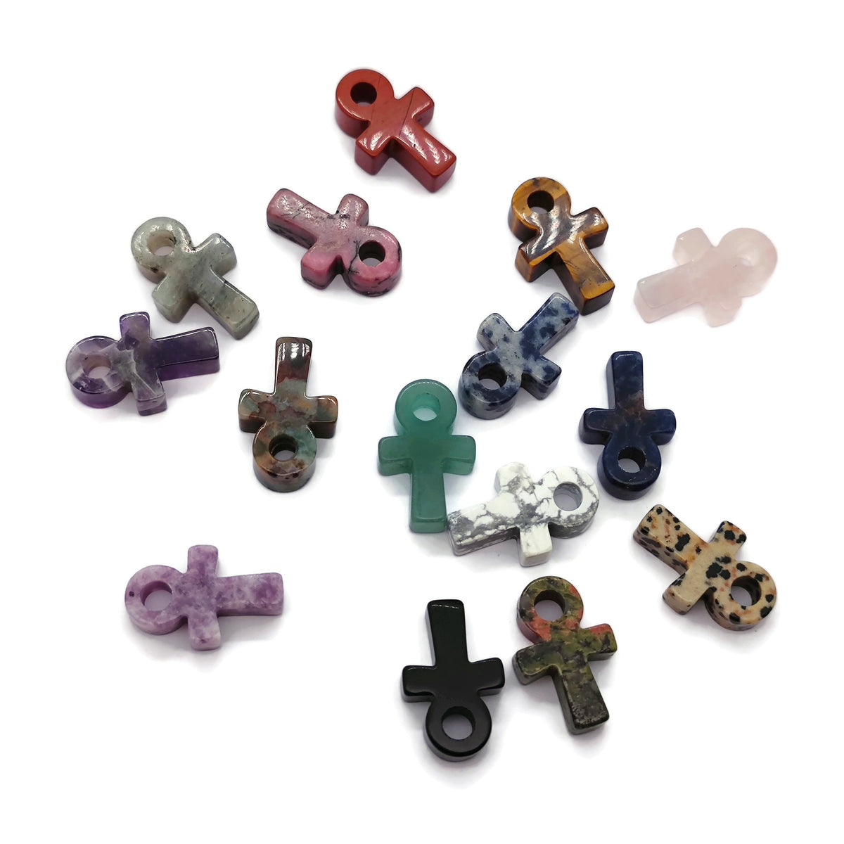 Handmade mini crystal ankhs from GemstoneGO, featuring colorful Anka totem carvings, perfect for spiritual or decorative use.
