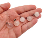 Rose quartz ball crystal pendant from GemstoneGO, round gemstone for jewelry making, featuring a polished pink quartz sphere.