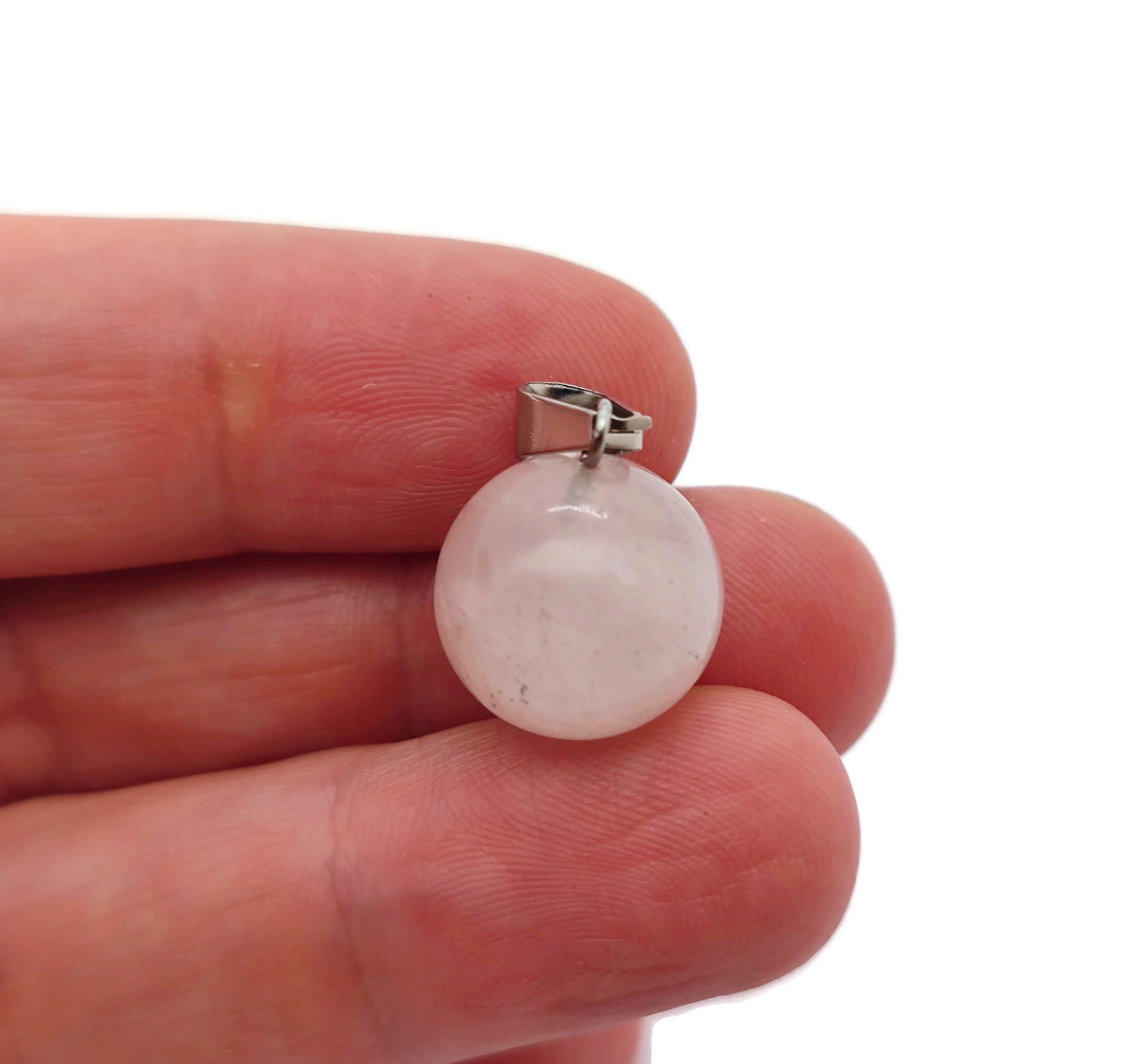 Rose Quartz crystal ball pendant from GemstoneGO, featuring a smooth round gemstone for jewelry making and decorative use.