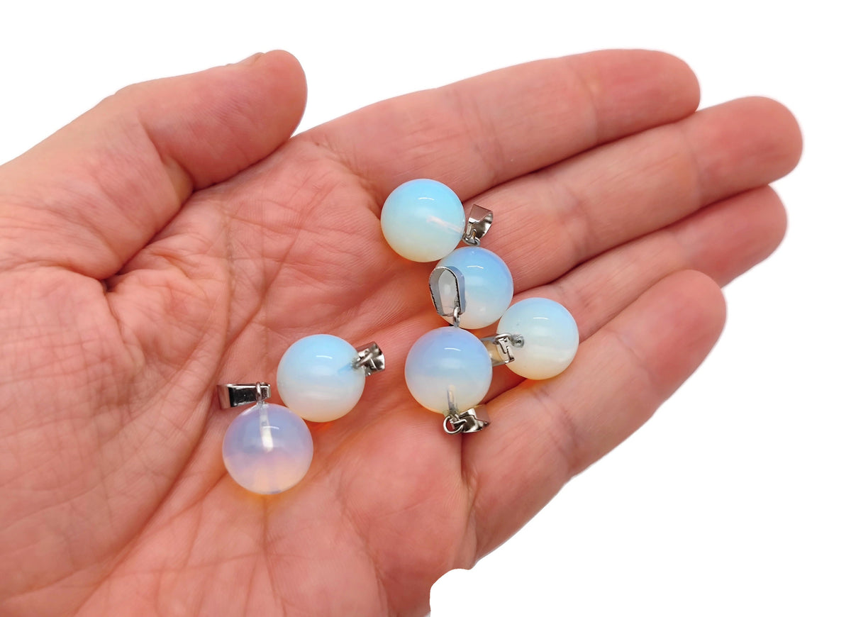 Opalite crystal ball pendant from GemstoneGO, round gemstone jewelry making accessory, smooth polished orb for necklaces.
