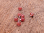 Cherry Quartz ball crystal pendant from GemstoneGO, round gemstone jewelry making pendant with polished cherry-colored quartz.