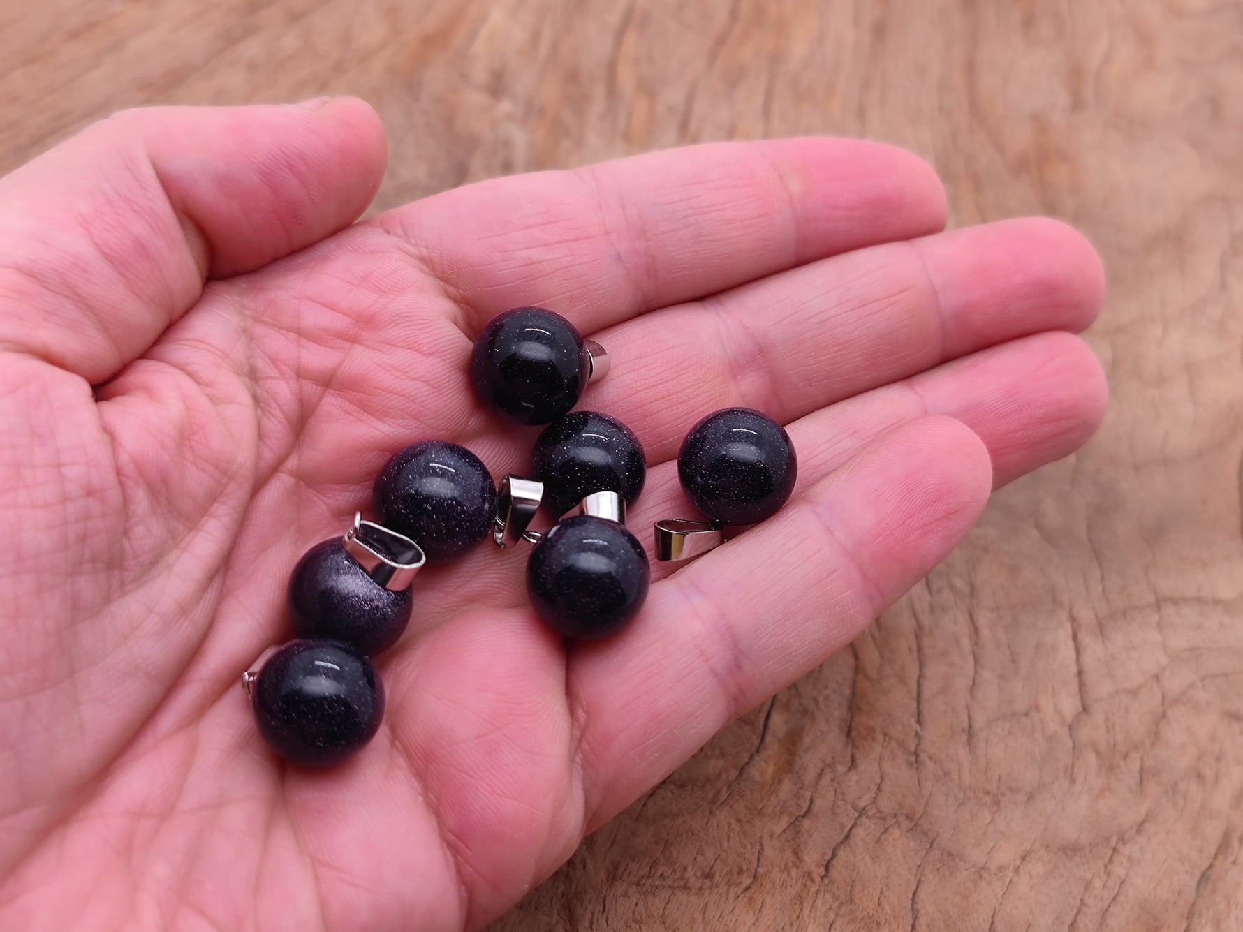 Blue Goldstone crystal ball pendant with a smooth round shape, ideal for jewelry making, by GemstoneGO.