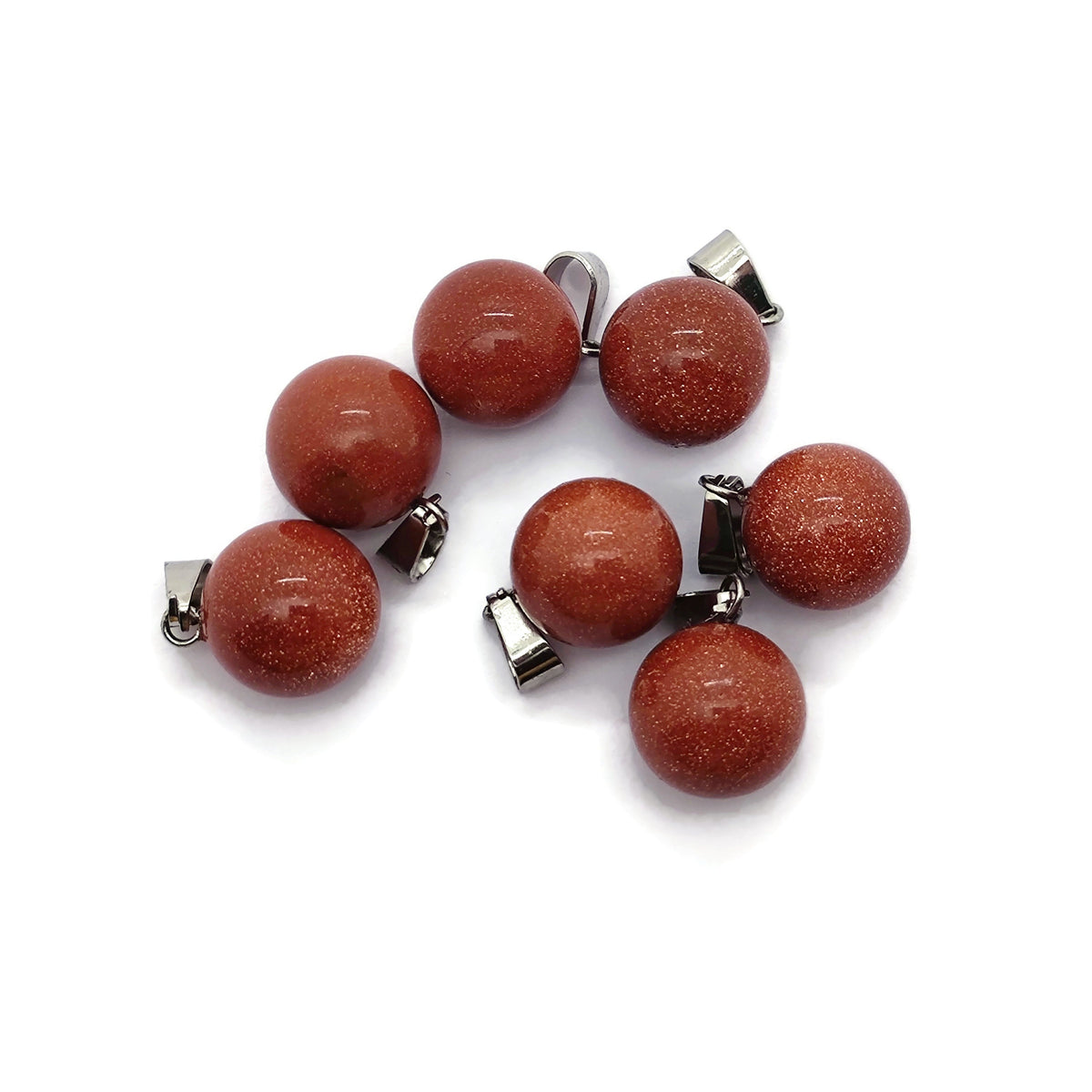 Goldstone crystal ball pendant, round jewelry making accessory from GemstoneGO, showcasing a polished gold-colored gemstone sphere.
