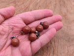 Goldstone ball crystal pendant from GemstoneGO, featuring a round, shimmering gemstone perfect for jewelry making.